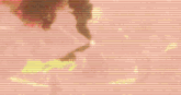 a blurred image of a fire with a few lines in the background