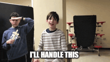 a boy wearing a blue adidas sweatshirt stands next to another boy who says i 'll handle this
