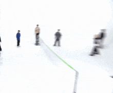 a blurry picture of a man throwing a ball with korean writing on the bottom