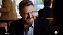 smiling rafael barba law and order special victims unit grinning happy