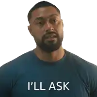 a man with a beard is wearing a blue shirt that says " i 'll ask "