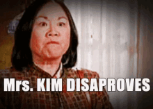 a woman in a plaid shirt says mrs. kim disapproves ..
