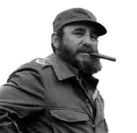a man with a beard wearing a hat and jacket smoking a cigar