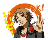 a boy with headphones giving an ok sign
