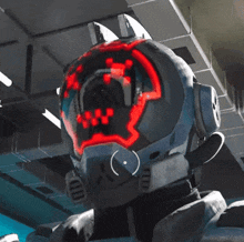 a robot with a red light on it 's face and ears