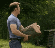 captain america pecs steve rogers age of ultron ripping logs with bare hands