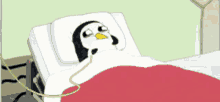 a cartoon penguin is laying in a hospital bed with a hose attached to it