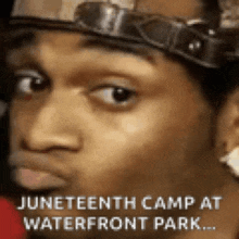 a close up of a man 's face with a caption that says juneteenth camp at waterfront park