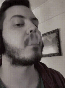 Smoking Beard GIF - Smoking Beard Undercut GIFs