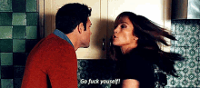 a man and a woman are having a fight and the woman is saying go fuck yourself