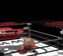 a boxing ring with a red car in the background and the word tm on the floor