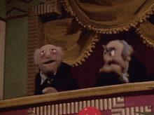a blurred image of a puppet in a theater