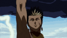 a man with his arm in the air with a blue sky behind him