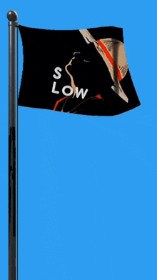 a flag that says ' s low ' on it is flying in the wind