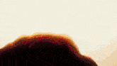 a painting of a mountain with a white background and red spots