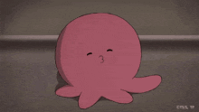 a pink octopus covering its mouth with its hand