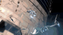 a helicopter is flying over a building with the letter e on the bottom