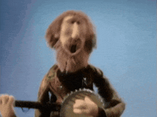 a cartoon character playing a banjo with his mouth open