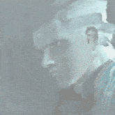 a close up of a person 's face with a serious look on his face