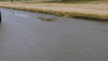 a person riding a motorcycle on a road