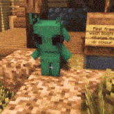 a green minecraft character is standing next to a sign that says " feel free wash boots change the uv colour "
