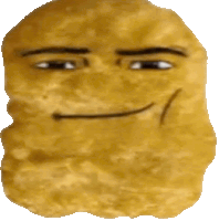 a chicken nugget with a cartoon face drawn on it