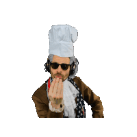 a man in a chef 's hat and sunglasses is pointing