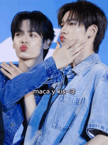 two young men making funny faces with the words maca y kis < 3 on the bottom
