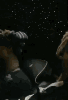 a blurry picture of a person 's face and hands