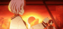 a girl with short pink hair is standing in front of a fire