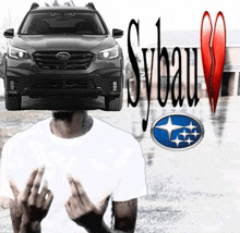 a man giving the middle finger with a subaru logo behind him