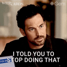 a man says i told you to stop doing that in front of a laptop