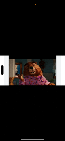 a picture of a beaver wearing a pajama top