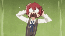 a boy with red hair and glasses holds his head