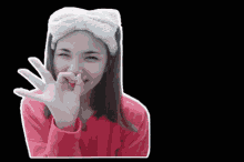 a woman wearing a headband with the word maacih on the bottom right