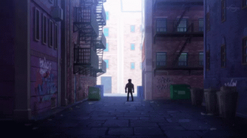 A person walking down a narrow alley way photo – Free Urban Image on  Unsplash