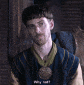 a man with a beard says why not in a gif