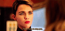 a woman with short hair is talking to another woman and says `` then i have to stop you . ''