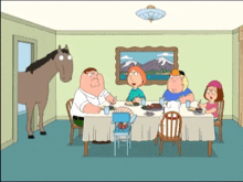 a family sitting around a table with a horse standing in the background