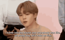 a man is talking about how he came into the house and everybody was like , oh pretty boy let 's hate on him .