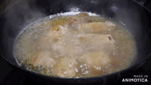 a pan of food is being cooked and the words made in animotica are visible