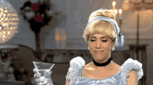 a woman dressed as cinderella is holding a martini and saying whatever