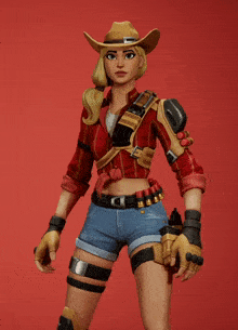 a woman in a cowboy hat holds a gun