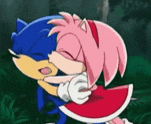 sonic the hedgehog and amy rose are hugging each other in the woods .