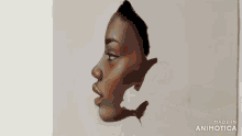 a painting of a woman 's face is being made in animotica