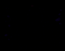 a person is holding a purple light saber in their hand in the dark .