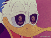 a close up of donald duck 's face with two women behind his eyes