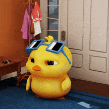 a cartoon duck wearing sunglasses is standing in a room