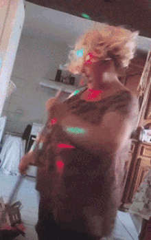 a blurry photo of a woman standing in front of a mirror