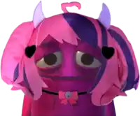 a pink and purple stuffed animal with horns and a bow